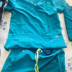 Figs. Teal color small size scrub set.